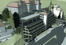 Sinaia, Perla Carpaţilor – sluţită de o parcare din beton şi sticlă, între două clădiri istorice ale oraşului